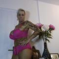 Blonde dicktittige Milf Bild